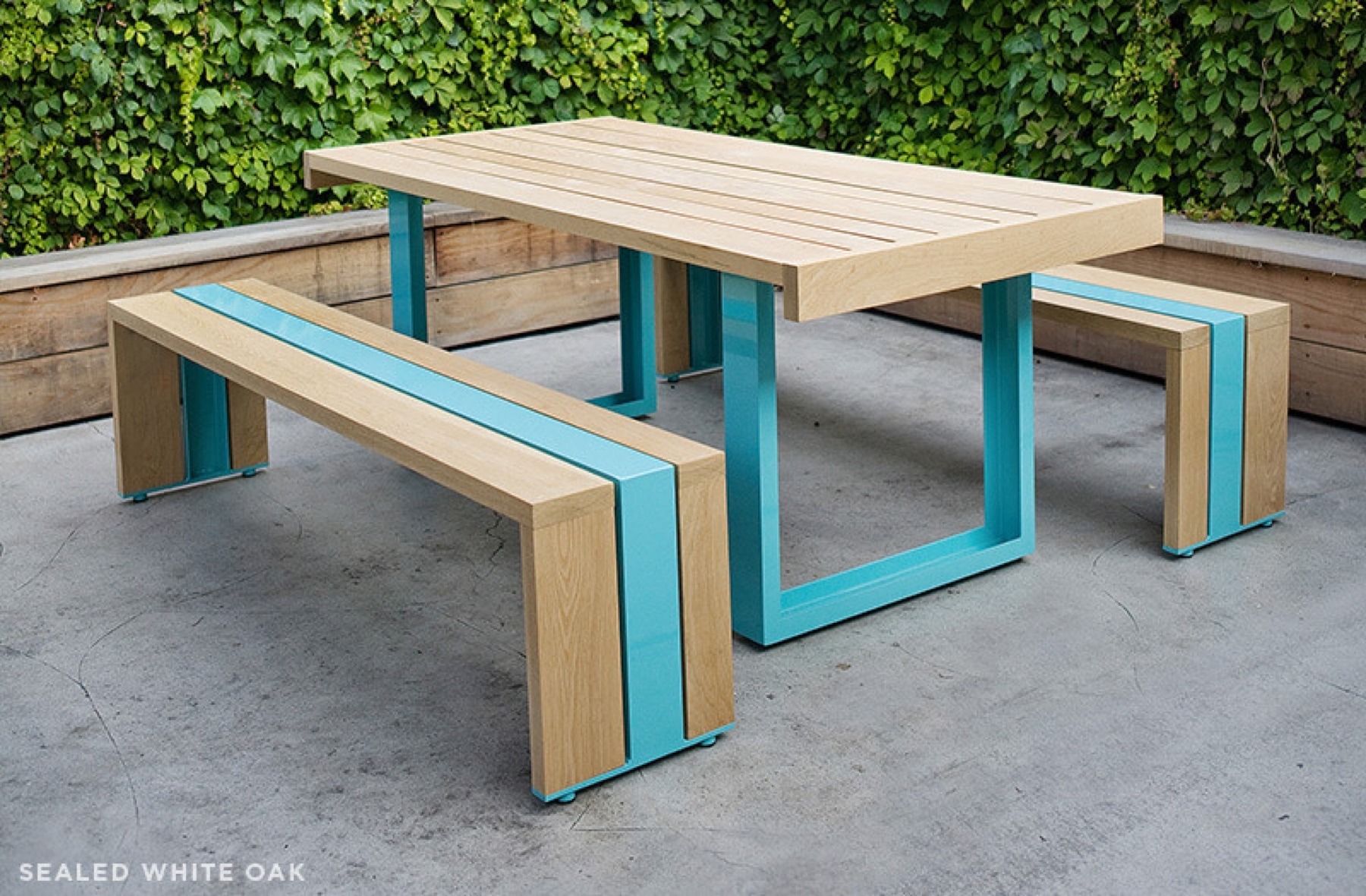 The SR Outdoor Table Set in American white oak and powder-coated aluminum from Scout Regalia. Photograph by Dylan + Jeni.