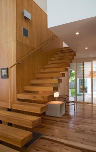 Locally sourced pecan, a regional species of hickory, forms the flooring, paneling, and stair treads in this Fairfield, TX, house by architects Webber + Studio. Photograph by Jacob Termansen.