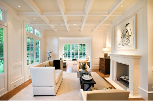 An unobtrusive coffered ceiling helps create low-key drama in the quietly sumptuous living room of an Atherton, CA, house designed and built by Pacific Peninsula Group. Photograph by Bernard Andre