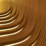 The center’s free-form auditorium is completely lined with American white oak. Photo by Hufton + Crow