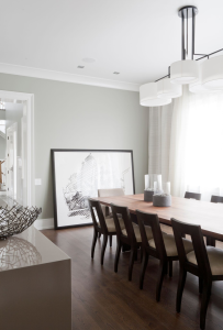 Walnut chairs stained dark espresso and a walnut table in a lighter shade join the dining room’s medium-dark walnut floor. Photograph David Gilbert