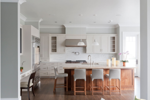 Stained lighter than the floor, the walnut kitchen island stands out like a piece of furniture. Photograph David Gilbert