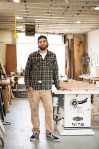 Artisan hardwood furniture maker Joe Weiss in Skana Design’s central Massachusetts workshop.