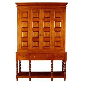 Shown in tiger maple, the William & Mary-style entertainment center features barley-twist legs and raised paneling on the bi-fold doors.